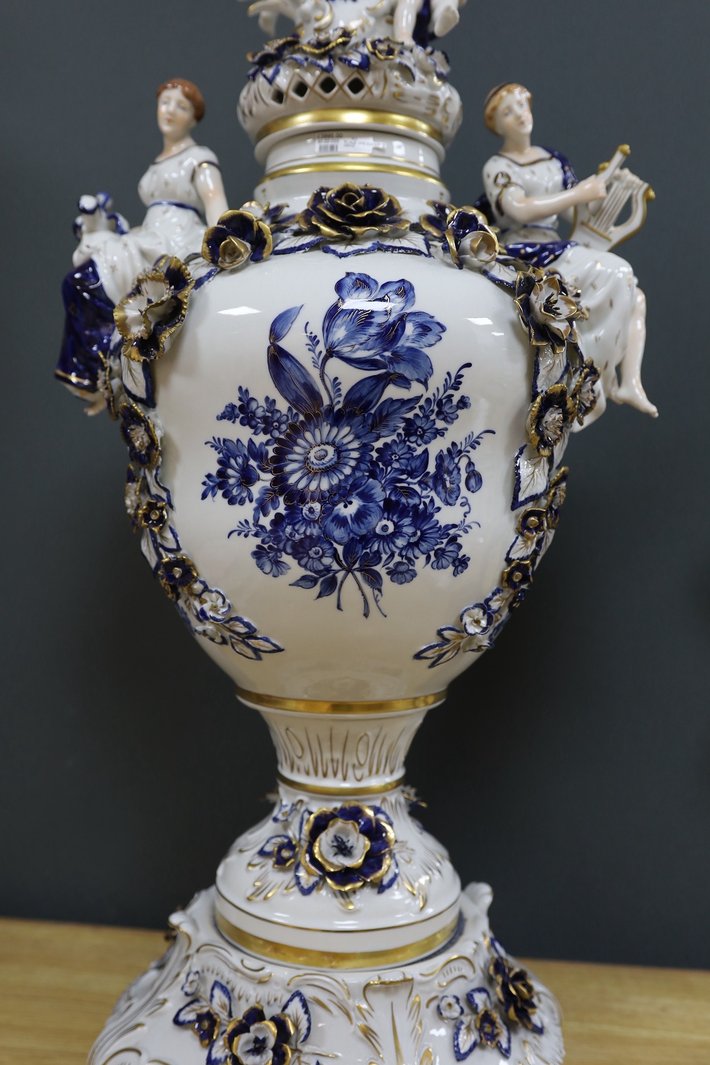 A large and impressive gilt blue and white Dresden lidded urn on stand - 77cm high